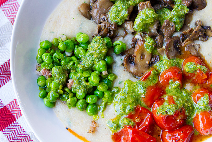 Herbed Farro Polenta Topped With Veggies & Celery Leaf Pistachio Pesto