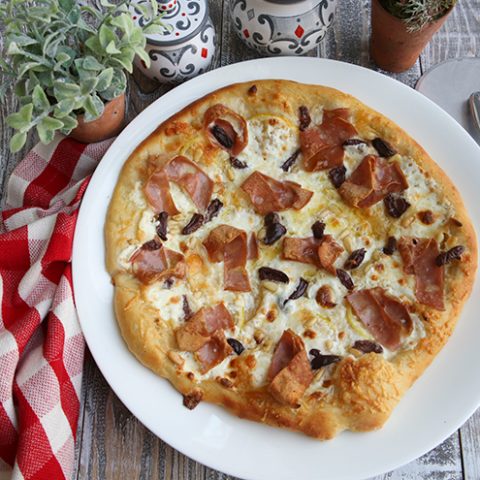 Pizza With Lemon, Mortadella, and Black Olives