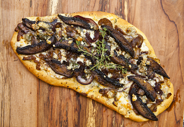 Flatbread With Caramelized Onions, Portobello Mushrooms, and Gorgonzola Crumbles